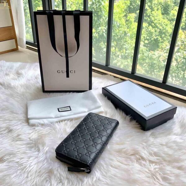 Ví dài Gucci GG Embossed Leather Wallet In Black like auth