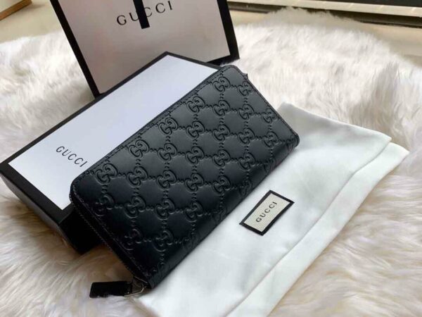 Ví dài Gucci GG Embossed Leather Wallet In Black like auth